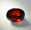 Bild 1 von 2.33 ct. Orange-roter ovaler 7.8 x 6.2 mm Spessartin Granat