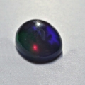 Bild 2 von 3.10 ct. Black oval 12 x 9.5 mm Ethiopian Multi Color Opal