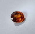 1.19 ct. Schöner orangeroter ovaler 6.4 x 5.7 mm Spessartin Granat