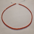Orange red Saphire string 73 ct with circular disks Ø 3 mm 42 cm length