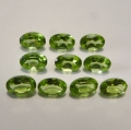5.05 ct VS! 10 pieces fine green oval 6 x 4 mm Pakistan Peridot Gemstones. Nice color !