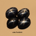 3.48 ct  4 Stück dunkelblaue ovale 6 x 4 mm Blue Star Sternsaphire