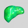 Bild 1 von 3.8 ct. Pad green sparkling 15 x 9 mm Ethiopian Opal Cabochon 