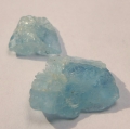 Bild 2 von 7.8 ct. 2 blue 15 x 12 und 10 x 9 mm Rough Aquamarine 