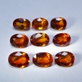Bild 1 von 6.05 ct. 9  Stück orangerote ovale 6 x 4.5 mm Spessartin Granate