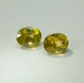 Bild 1 von 1.21 ct. Schönes Paar ovale grünlich gelbe 5.4 x 4.4 mm Madagaskar Titanit Sphen