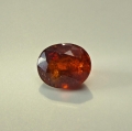 Bild 1 von 1.98 ct. Orangeroter ovaler 7.4 x 6.2 mm Spessartin Granat