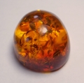 Bild 2 von 60.80 ct. Honiggelber ovaler 33 x 29 mm Ostsee Bernstein 