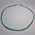 Emerald string 27 ct with circular disks Ø 3.3 mm 42 cm length