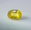 Bild 1 von 0.96 ct.  Zarter ovaler gelblich grüner 7 x 5 mm Titanit Sphen