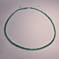 Emerald string 26 ct with circular disks Ø 3.3 mm 42 cm length