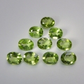 Bild 1 von 3.80 ct VS! 10 pieces fine green oval 5 x 4 mm Pakistan Peridot Gemstones. Nice color !