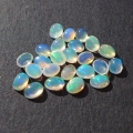 Bild 1 von 2.4 ct. 24 Pieces white oval 4 x 3 mm Multi-Color Ethiopia Opal Cabochons