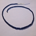 Saphire string 65.7 ct with circular disks Ø 4.7 - 3.2 mm 42 cm length