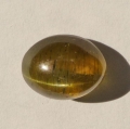 10.08 ct. Yellow greenish oval 13 x 10 mm Apatite Catseye