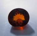 Bild 1 von 2.45 ct . Orangeroter ovaler 8.5 x 7.8 mm Spessartin Granat