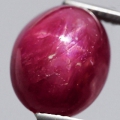 Bild 1 von 11.81 ct.  Sehr schöner ovaler 13.1 x 10.5 mm Afrika RED- STAR Stern Rubin