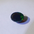 Bild 2 von 1.40 ct. Black oval 9 x 7.3 mm Ethiopian Multi Color Opal