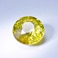 Bild 1 von 1.32 ct.  Toller runder grünlich gelber 6.7 mm Titanit Sphen