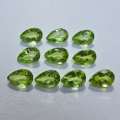 4.44 ct. 10 pieces fine green 6 x 4 mm Pakistan Peridot Pears. Nice color !