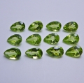 Bild 1 von 5.23 ct. 12 pieces fine green 6 x 4 mm Pakistan Peridot Pears. Nice color !