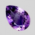 Bild 1 von 23.43 ct.  Schöner violetter 21.7 x 15.3 mm Amethyst Tropfen