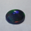 Bild 1 von 3.10 ct. Black oval 12 x 9.5 mm Ethiopian Multi Color Opal