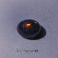 Bild 2 von 1.39 ct. Black oval  9 x 7 mm Multi-Color Ethiopia Opal Cabochon