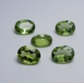 6.44 ct 4 pieces fine green oval 8x6mm Pakistan Peridot Gemstones. Nice color !
