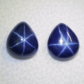 Bild 1 von 7.64 ct  Perfektes Paar dunkelblaue 10 x 8.7 mm Blue Star Sternsaphire