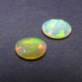 Bild 2 von 1.55 ct. Noble  pair of oval 8 x 6 mm Ethiopian Opal Gemstones