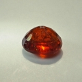Bild 2 von 1.98 ct. Orangeroter ovaler 7.4 x 6.2 mm Spessartin Granat