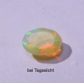 Bild 2 von 1.85 ct.  Natürlicher  facett. ovaler 10.5 x 7.7 mm Multi-Color Äthiopien Opal