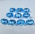 Bild 1 von 9.40 ct.  10 Stück ovale 5 x 7 mm Brasilien Sky Blue Topas Edelsteine
