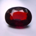 Bild 1 von 5.35 ct. Orange-roter ovaler 12.4 x 9.6 mm Spessartin Granat