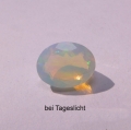 Bild 2 von 2.42 ct.  Feiner  facett. ovaler 11 x 9.7 mm Multi-Color Äthiopien Opal