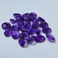 Bild 2 von 8.33 ct. 25 Stück ovale 5 x 4 mm Uruguay Amethyst Edelsteine