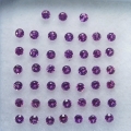 1 ct. 45 Stück runde violett-rote 1.5 mm Malawi Rhodolith Granate. Tolle Farbe!