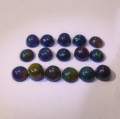 Bild 1 von 5.33 ct. 16 Stück schwarze ovale Ø 5 mm Multi Color Opale 