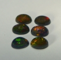 Bild 2 von 1.14 ct. 6 Stück schwarze ovale 5 x 3 mm Multi Color Opale 