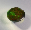 Bild 2 von 2.25 ct. Black oval 11 x 9 mm Ethiopian Multi Color Opal